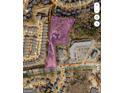 An aerial view outlining the property's boundaries, its location among neighborhood homes and nearby roadways at 1372 Auburn Rd, Dacula, GA 30019