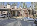 Townhouse exterior with carport and parking at 33 Cobblestone Crk, Peachtree City, GA 30269