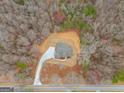 Aerial view of house showcasing private location surrounded by lush forest at 426 Ayers Rd, Bowdon, GA 30108