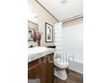 Clean bathroom with tub/shower combo and vanity at 1979 Cardell Rd # 16, Austell, GA 30168