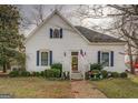 Charming two-story home with neat landscaping, walkway, and attractive curb appeal at 3810 2Nd Ave, Mansfield, GA 30055