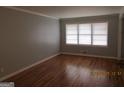 Hardwood floors and gray walls in living room at 423 Center Sw Cir, Conyers, GA 30094