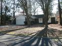 Brick ranch home with attached garage and driveway at 295 Adena W Ln, South Fulton, GA 30349