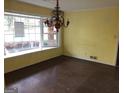 Dining room featuring hardwood floors, chandelier, and large windows at 138 Le Brun Ne Rd, Atlanta, GA 30342