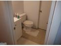 Small bathroom includes white fixtures, tile flooring, and a white sink cabinet at 3248 Brisbane Way, Lithonia, GA 30038