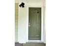 Modern front door with arched window detail at 1222 Bronx Nw St, Atlanta, GA 30314