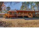 Ranch home with spacious deck and woodsy setting at 2461 Bethel Rd, Conyers, GA 30012