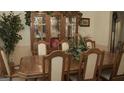 Formal dining room with a large wood table and hutch at 4768 Redbranch Rd, Decatur, GA 30035