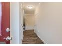 Bright entryway with hardwood floors and staircase at 3170 Fareed St, Douglasville, GA 30135