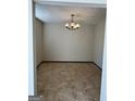 Bright dining room with a chandelier and tile floor at 3772 Saddle Ridge Dr, Snellville, GA 30039