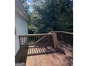 Wooden deck overlooks backyard, offering outdoor space at 3772 Saddle Ridge Dr, Snellville, GA 30039