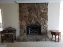 Stone fireplace as a focal point in the living room at 4767 Glenwhite Dr, Duluth, GA 30096