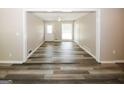 Open living area with vinyl plank flooring at 3130 Mars Hill Rd, Acworth, GA 30101