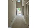 View of home entryway with a high ceiling and unfinished walls at 115 Yancey Rd, Covington, GA 30014