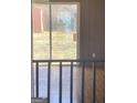 View of backyard through sliding glass doors at 5324 Crystal Ln, Atlanta, GA 30349