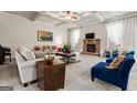 Spacious living room featuring a fireplace and coffered ceiling at 801 Carnegie Ct, Locust Grove, GA 30248