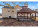 Backyard with a wooden gazebo and a storage shed at 360 Kaleb C, Mcdonough, GA 30252