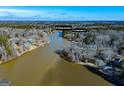 Aerial view of lakefront property with ramp access at 16 Edgewater Dr, Temple, GA 30179