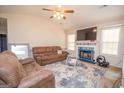 Spacious living room with a fireplace and neutral decor at 74 Canterbury Dr, Grantville, GA 30220
