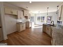 Modern kitchen with light cabinets, granite countertops, and stainless steel appliances at 3279 Greenhill Dr, Villa Rica, GA 30180