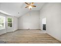 Spacious living room with hardwood floors and a ceiling fan at 5260 Shirewick Dr, Lithonia, GA 30058