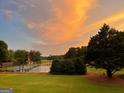 Community tennis court with sunset view at 7019 Blue Sky Dr, Locust Grove, GA 30248