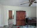 Living room with vintage furniture and carpeted floor at 1989 Tiger Flowers Nw Dr, Atlanta, GA 30314