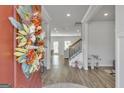Front entry with decorative wreath and view into a spacious living area at 5626 Wyncreek Sw Cir, South Fulton, GA 30331
