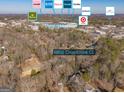 Aerial view showing home's location near shopping center at 8806 Clear Creek Ct, Douglasville, GA 30135