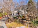 Two-story house with driveway and landscaping, seen from above at 8806 Clear Creek Ct, Douglasville, GA 30135