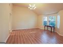 Spacious living room featuring hardwood floors and a large bay window at 4408 Idlewood Park, Lithonia, GA 30038