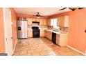 Spacious kitchen featuring stainless steel refrigerator and ample cabinetry at 5738 Antelope Trl, Atlanta, GA 30349