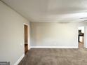 Bright living room with hardwood floors and view of kitchen at 2920 Springside Se Pl, Atlanta, GA 30354