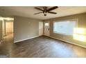 Bright living room featuring hardwood floors and neutral walls at 3226 Browns Mill Se Rd, Atlanta, GA 30354