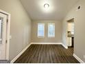 Bright dining area with hardwood floors and neutral walls at 3951 Wabash Ln, Ellenwood, GA 30294