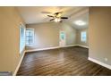 Spacious living room with vaulted ceiling, hardwood floors, and neutral walls at 3951 Wabash Ln, Ellenwood, GA 30294