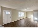 Living room with hardwood floors, neutral walls and lots of natural light at 2490 Habersham Dr, Decatur, GA 30032