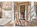 Townhouse front entrance with columns and wreath at 32 American Walk, Peachtree City, GA 30269