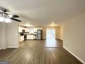 Open concept kitchen with stainless steel appliances at 4037 Regent St, Douglasville, GA 30134