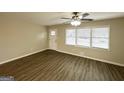 Bright and airy living room with hardwood floors at 4037 Regent St, Douglasville, GA 30134