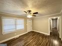 Living room features hardwood floors and neutral wall colors at 121 Pine Forest Dr, Dallas, GA 30157