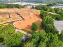 Aerial view of undeveloped land with construction equipment at 4995 Reservoir Dr, Douglasville, GA 30135