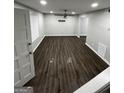 Spacious living room featuring dark laminate flooring at 139 Peyton Pl, Atlanta, GA 30311