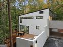 Contemporary home with deck and wooded setting at 1153 Dawn View Nw Ln, Atlanta, GA 30327