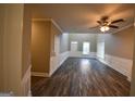 Spacious living room featuring hardwood floors and high ceilings at 4879 Pinnacle Dr, Stone Mountain, GA 30088