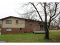 Brick home with deck and large backyard at 2405 Falls River Dr, Lithia Springs, GA 30122