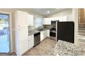 Modern kitchen with stainless steel appliances and granite countertops at 3245 Bunny Ln, Decatur, GA 30034