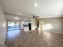 Spacious living room with hardwood floors and access to the kitchen at 3245 Bunny Ln, Decatur, GA 30034