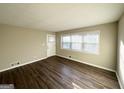 Bright living room featuring hardwood floors and neutral walls at 60 Oak Sw Dr, Atlanta, GA 30354