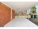 Covered patio with brick walls and a concrete floor at 6559 Allatoona Rd # 19, Morrow, GA 30260